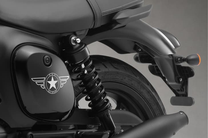 Close up shot of the left rear suspension and seat on the Jawa 42 FJ All Stars Edition