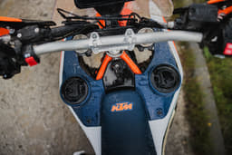 A close up shot of the two 3.5-litre front fuel tanks on the KTM 690 Rally.