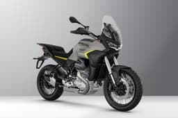 Inside render showing the Moto Guzzi Stelvio's front right three quarter in Grigio Climbing colour.