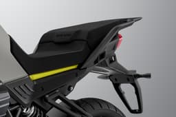 Inside close up render showing the Moto Guzzi Stelvio's rider and pillion seats.