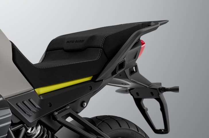Inside close up render showing the Moto Guzzi Stelvio's rider and pillion seats.