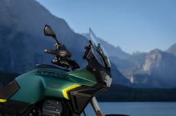 A right, close up shot of the Moto Guzzi Stelvio's 21-litre tank and handguards that are standard accessories.
