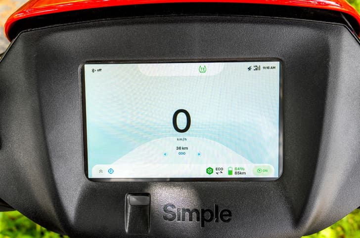 An outside close up showing the Simple Wave's optional TFT instrument cluster