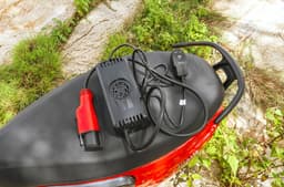 An outside shot showing the Simple Wave's standard 750W portable charger