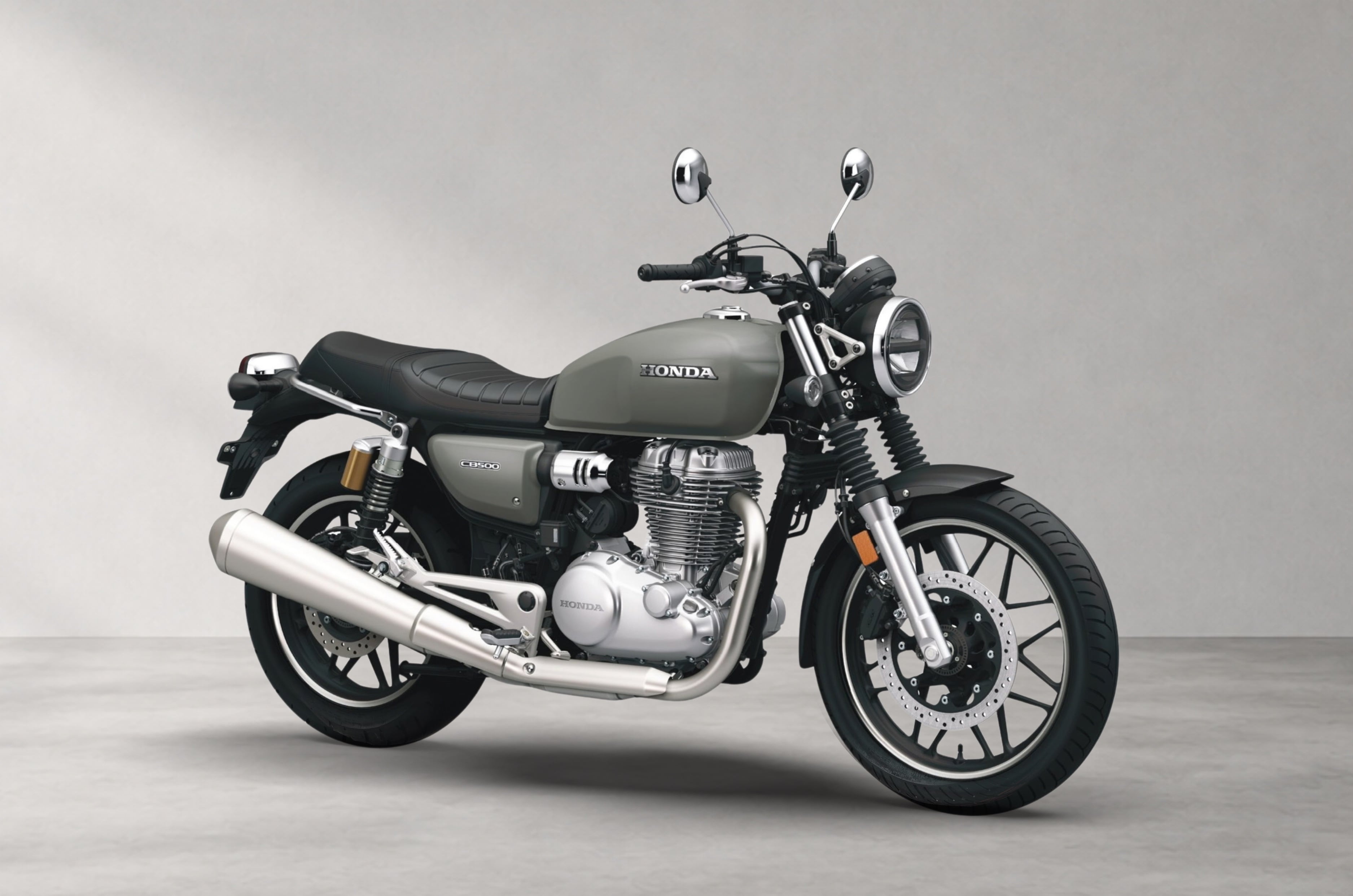 Inside render showing the Honda CB500 in Pearl Deep Ground Grey colour.