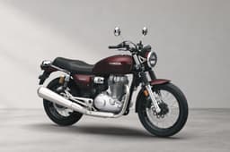 Inside render showing the Honda CB500 in Rebel Red Metallic colour.