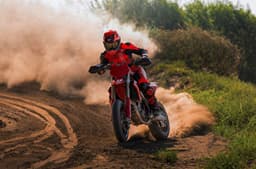 Outside image showing a drift being performed on the Ducati Desmo450 SM