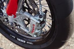 An outside close up image of the Ducati Desmo450 SM's front Brembo calipers.