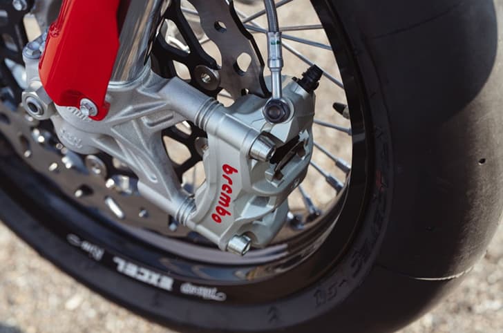 An outside close up image of the Ducati Desmo450 SM's front Brembo calipers.