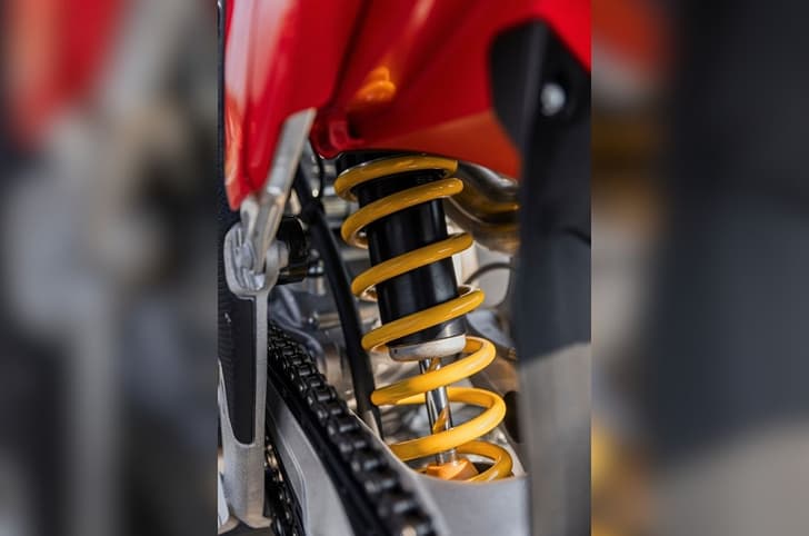 An outside close up image of the Ducati Desmo450 SM's rear monoshock.