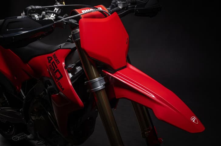 An inside close up image showing the front of the Ducati Desmo450 SM, without a headlight.