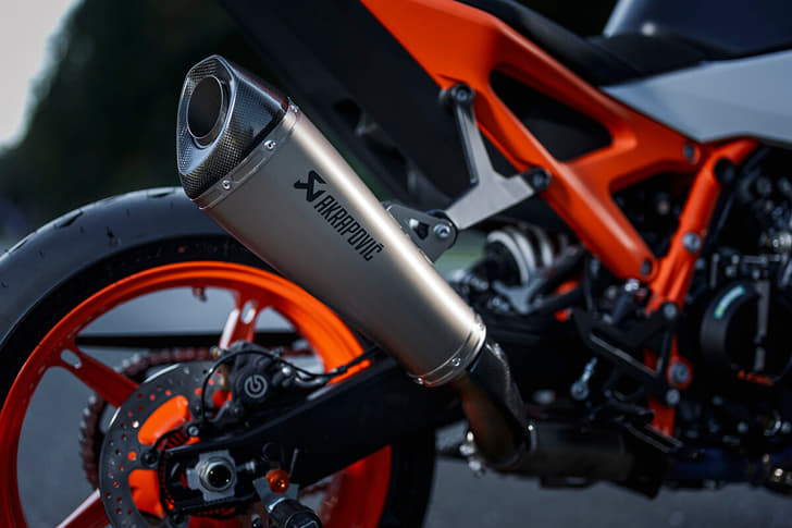 An outside close up image showing the KTM 990 Duke R's Akrapovic exhaust end can.