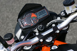 An outside close up image showing the 2007 KTM 990 Duke R's analogue-digital instrument cluster