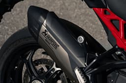 Close-up shot of the Multistrada V4 Pikes Peak's Akrapovic exhaust end can.