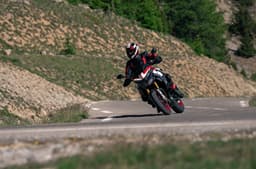 Rider performing a right leaned turn on the Multistrada V4 Pikes Peak.