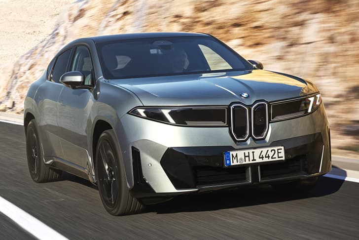 bmw iX4 on road
