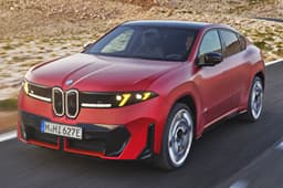 bmw iX4 on road