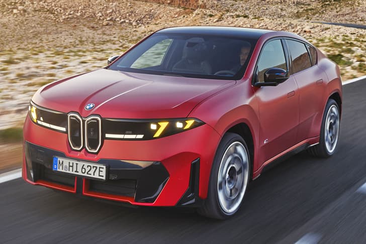 bmw iX4 on road