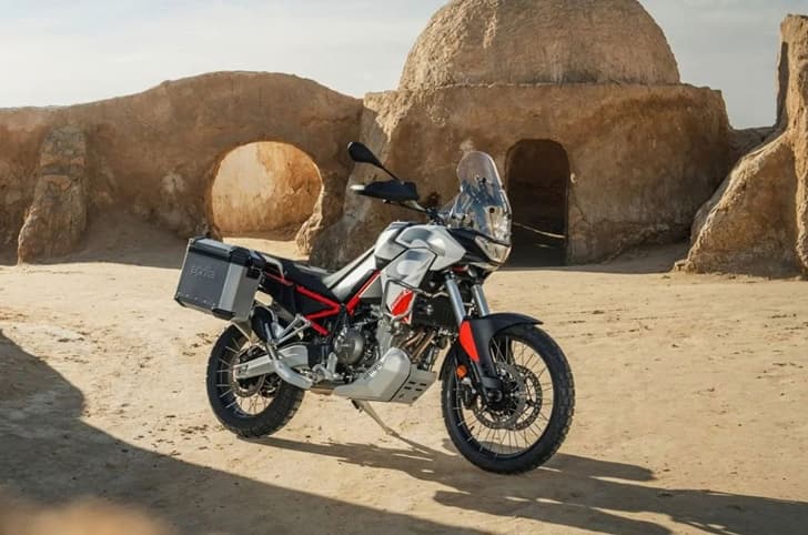 An outdoor shot of the standard Tuareg 660 fitted with the factory side panniers