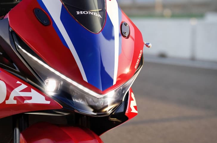 A closeup outdoor shot of the headlight of the Honda CBR500R Four