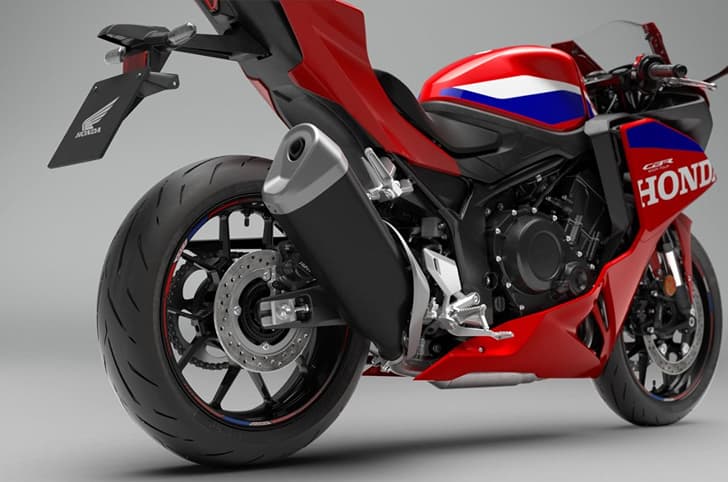 A closeup indoor render showing the exhaust of the Honda CBR500R Four