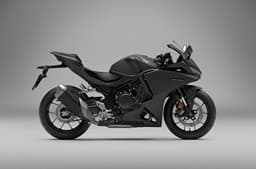 An indoor render of the Honda CBR500R Four's right side profile in matte black finish