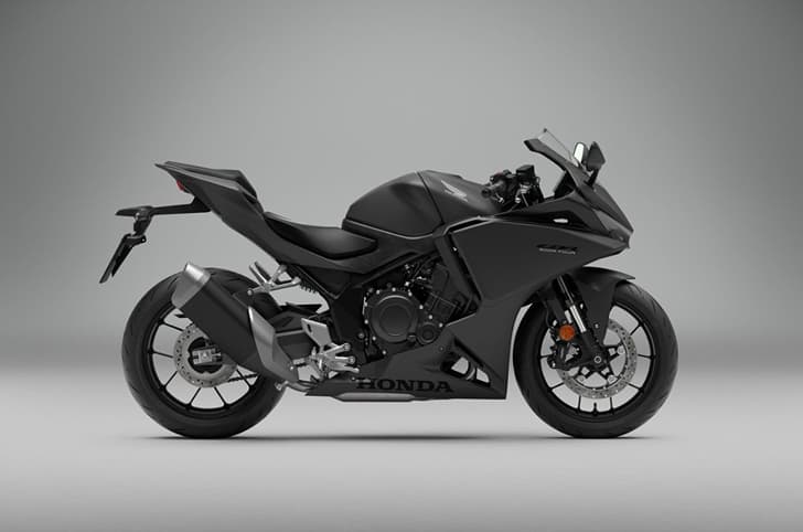 An indoor render of the Honda CBR500R Four's right side profile in matte black finish