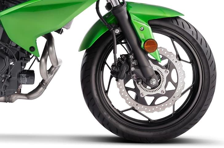 A closeup indoor render of the Kawasaki Z300's front wheel