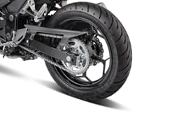 A closeup indoor render of the Kawasaki Z300's rear wheel