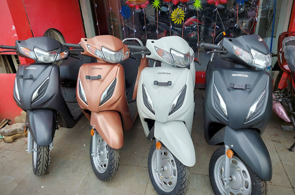Honda Activa scooters outside a dealership