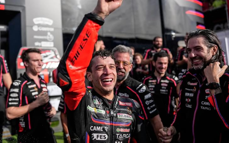 Bez celebrates his race win with his team