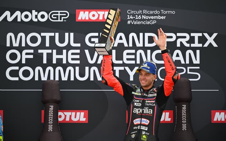 Bez celebrating his win on the podium