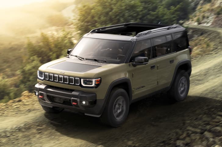 jeep recon front three quarter driving jeep recon in studio