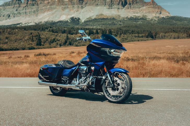 CVO Road Glide parked against mountains