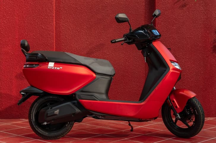 Ather Rizta right side profile static on road