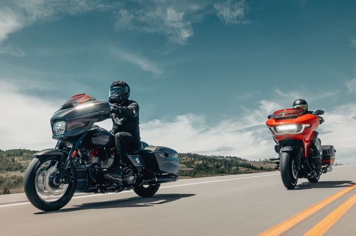 2026 CVO Street Glide ST and 2026 CVO Road Glide ST tracking shot on the highway