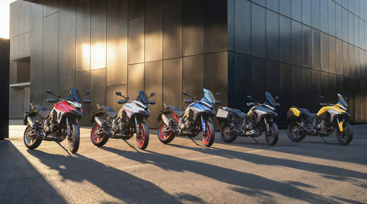 Multiple Ducati Multistrada V4 bikes in different colours and trims