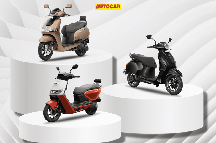 TVS, Bajaj, and Ather scooters on a podium