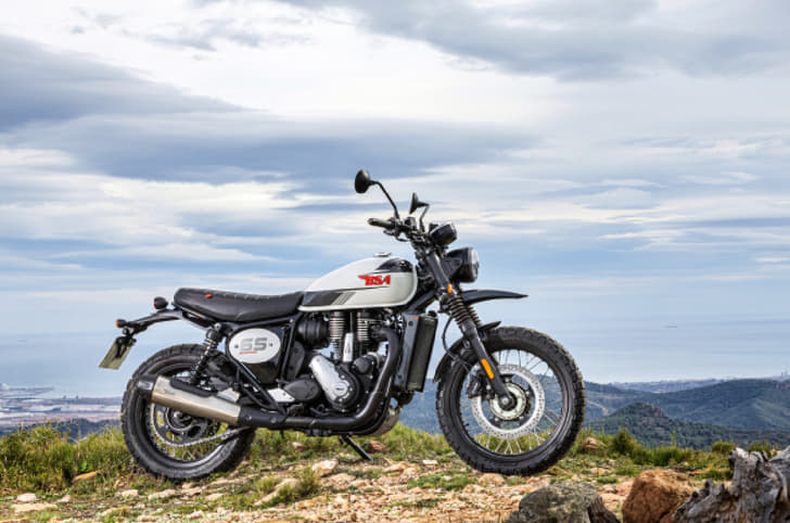 Side profile of Scrambler 650 with cloudy skies in the background