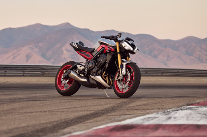 Triumph Street Triple 765 RX parked on a race track