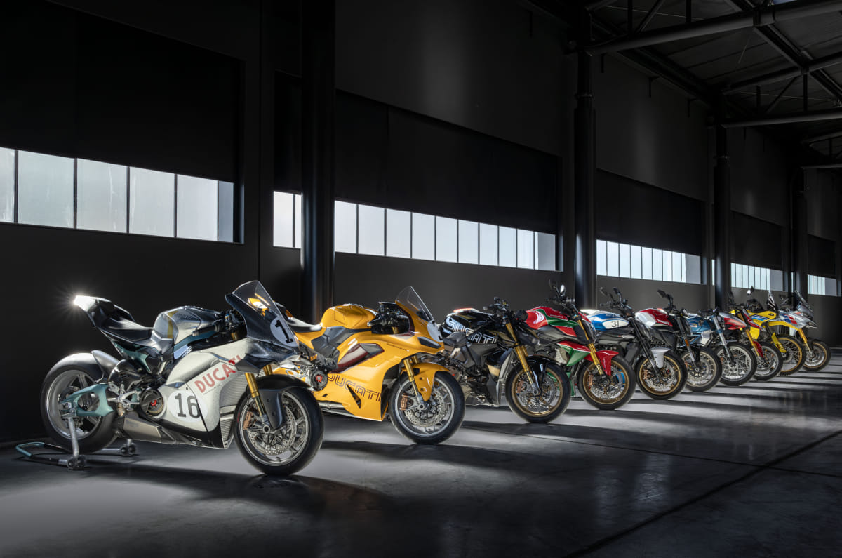 Ducati Collezione 100 bikes parked in a row inside a garage
