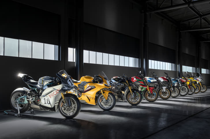 Ducati Collezione 100 bikes parked in a row inside a garage
