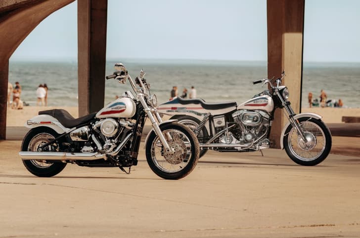 2026 Harley Davidson Super Glide with 1971 Super Glide parked at beachside