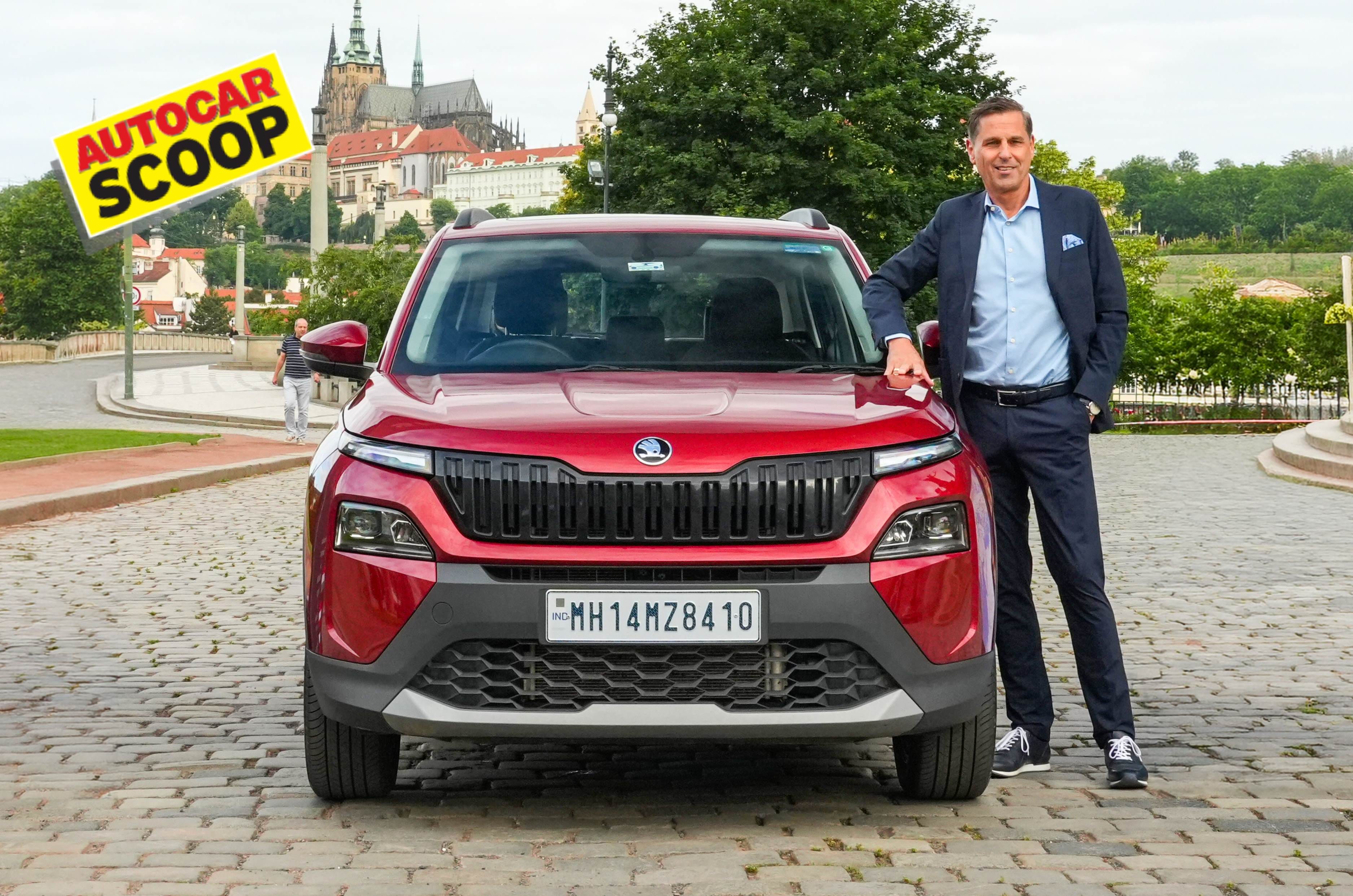 skoda kylaq next to ceo klaus zellmer