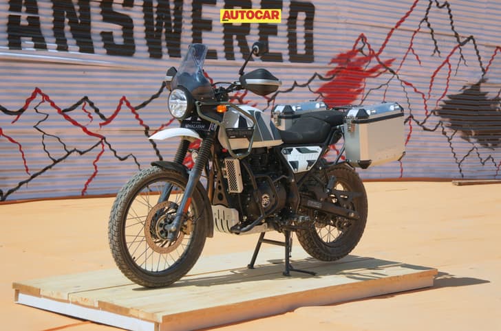 An outside image of the Royal Enfield Himalayan 440 in Nelong White colour.