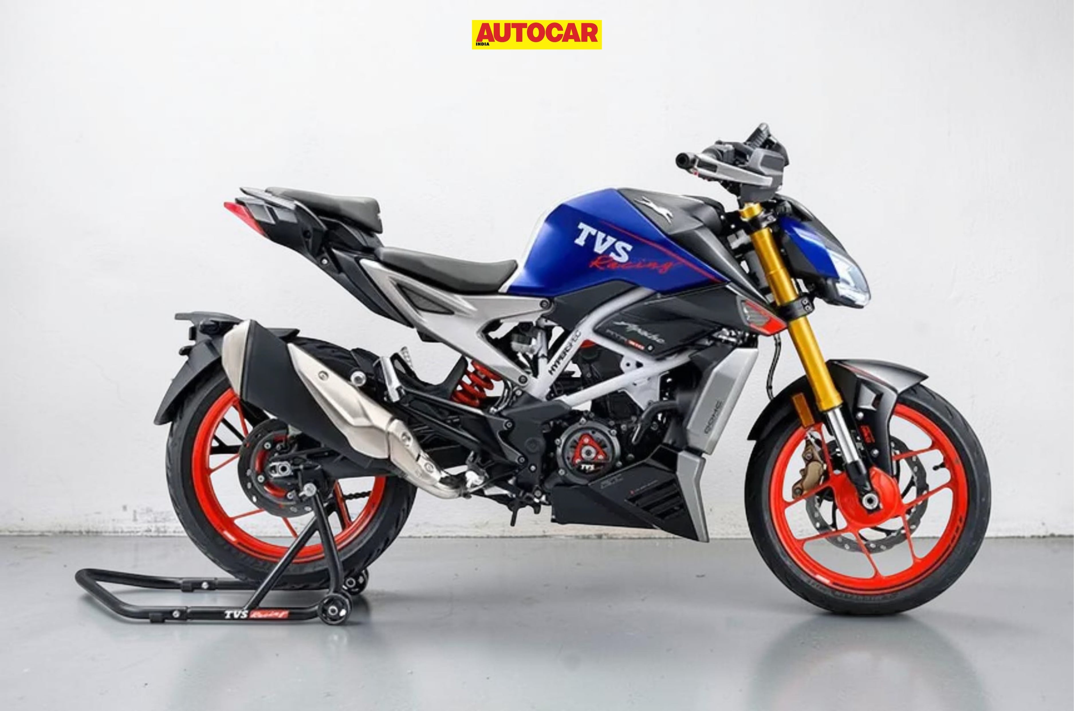 An indoor render showing the TVS Apcahe RTR 310 Sepang Blue colour