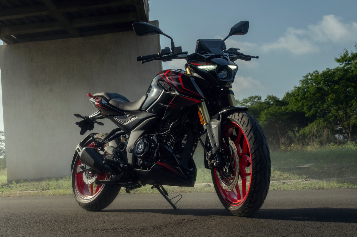 New Bajaj Pulsar N250SS parked under a bridge