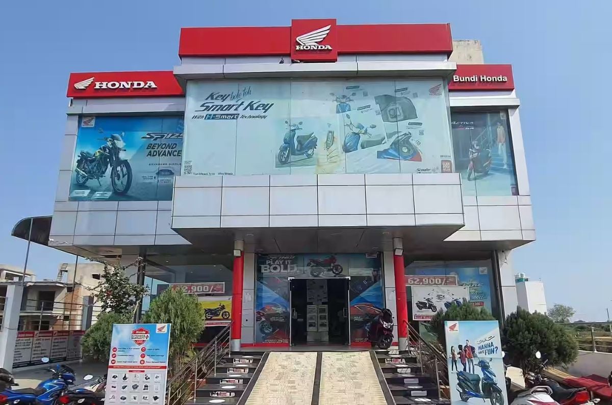 An outdoor shot of a Honda two-wheeler showroom