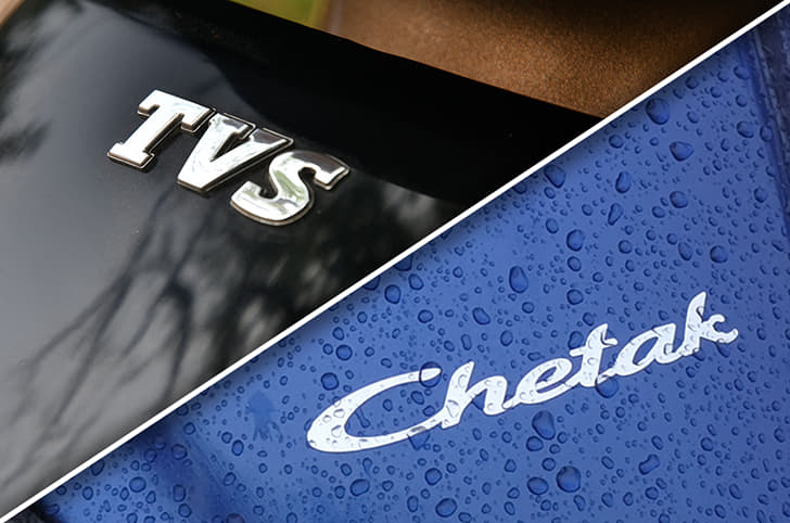 Close up of TVS and Chetak logos.