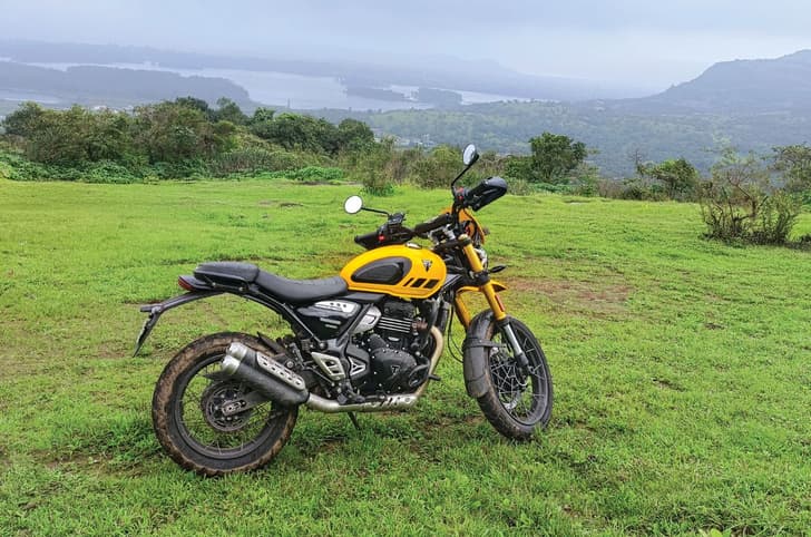 Triumph Scrambler 400 XC right side profile static in field